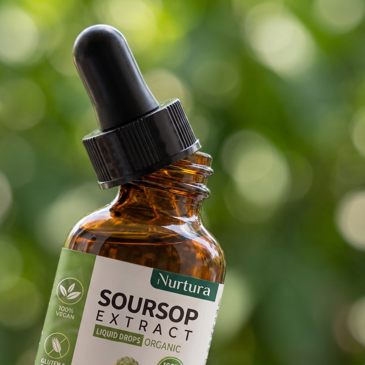 Nurtura Soursop Extract Drops bottle close-up, dropper cap and label