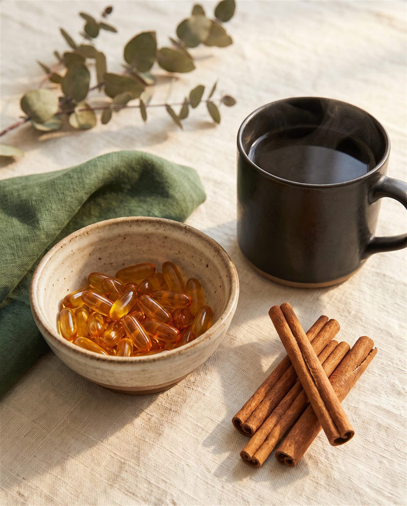 One softgel with morning coffee